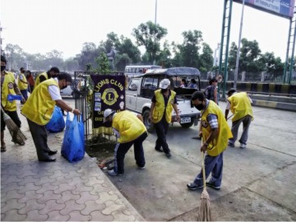 Members of Lions Club of Imphal City doing social (cleanliness) service at BT Flyover and surrounding areas