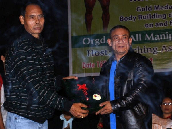 Two times Mr World Champion Arambam Boby and South Asian Gold Medallist Khundrakpam Pradipkumar being felicitated by All Manipur Gymnasium Welfare Association