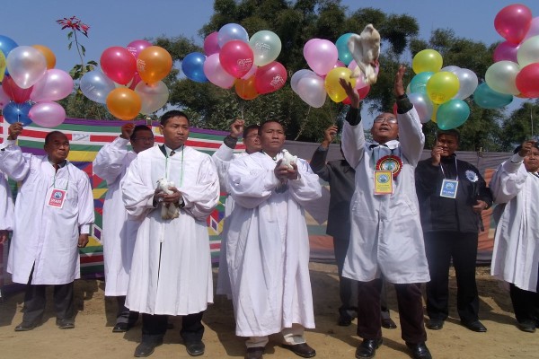 Priests/pastors releasing balloons & Doves to mark the Gangte gospel centenary celebration
