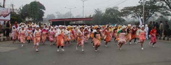 Women folks running a race from Nupi Lan Complex till Singjamei Chingamakhong in Imphal as part of Nupi Lan observance