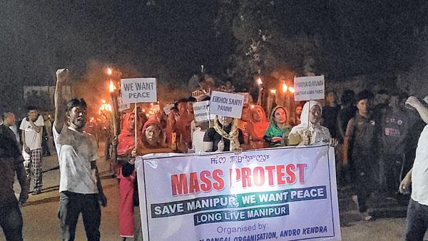 Pangal community form human chains, take out torch rallies with calls for peace