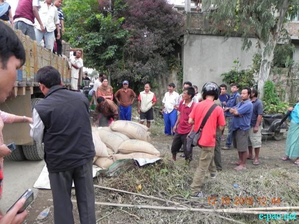 Flood in Imphal East - Relief Material Distribution :: October 12 2010