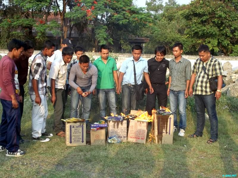 Burning of goods made at Bangalore in Imphal : Protest for Loitam Richard :: 28 May 2012