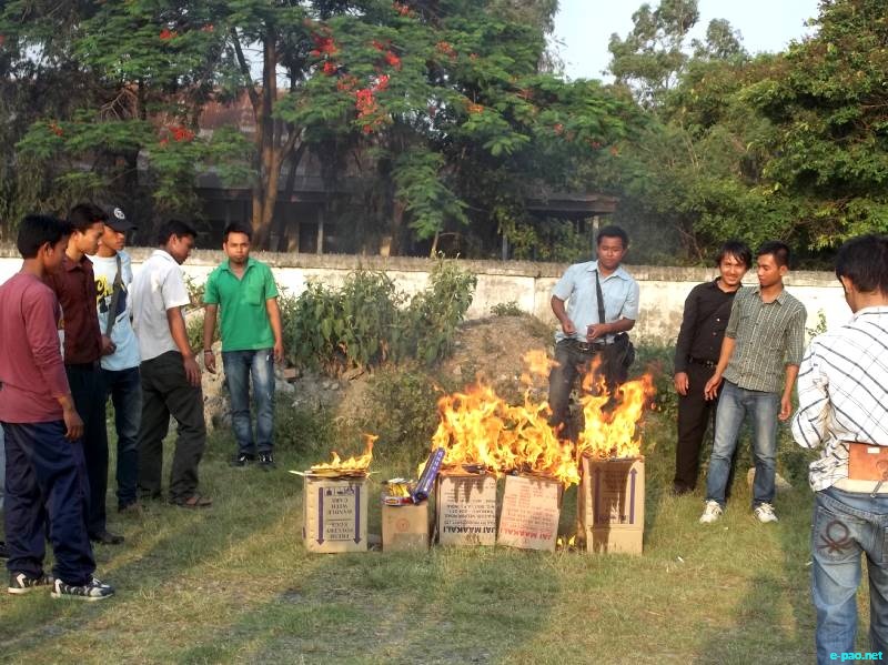 Burning of goods made at Bangalore in Imphal : Protest for Loitam Richard :: 28 May 2012