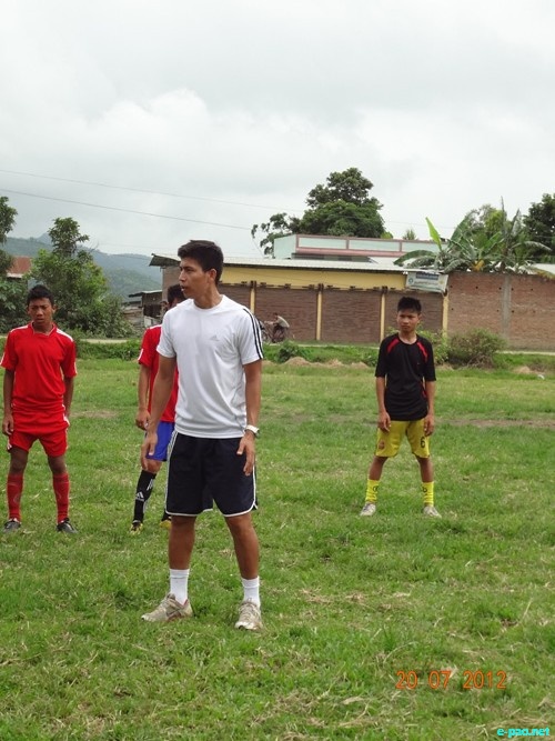 Potshangbam Renedy (International footballer) giving  football tips  to Under-14 boys at Awang Potshangbam :: July 20 2012