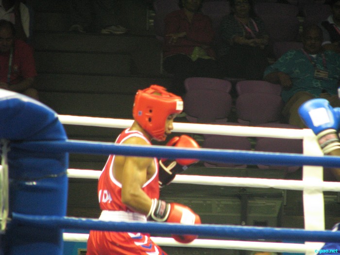 Mayengbam Suranjoy in first round of Boxing at CWG 2010 :: October 07 2010
