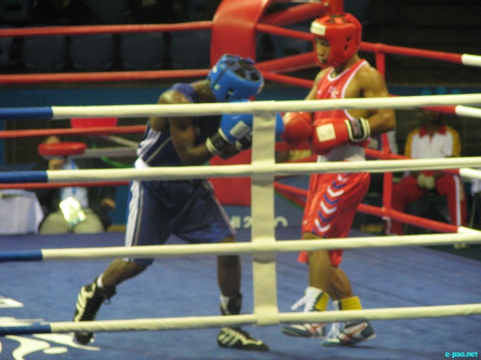 Mayengbam Suranjoy in first round of Boxing at CWG 2010 :: October 07 2010
