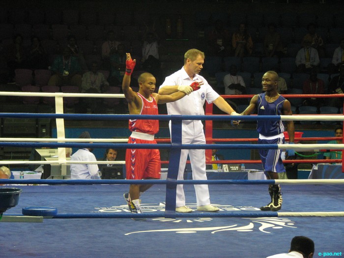 Mayengbam Suranjoy in first round of Boxing at CWG 2010 :: October 07 2010