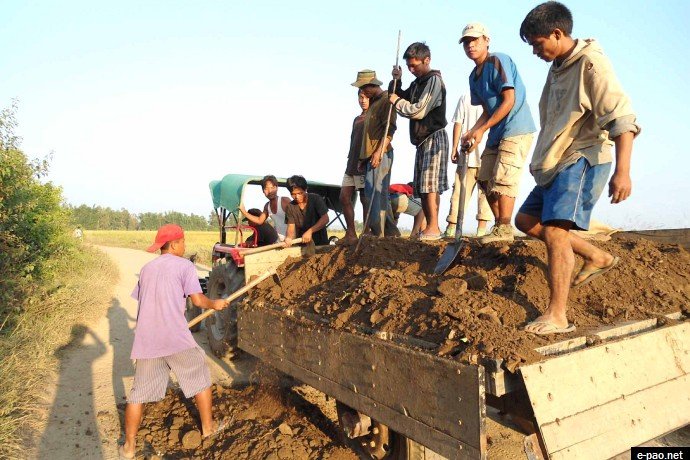 Failure of Government: Volunteers of Khousabung Youth Club in Churachandpur District repairing Dr Kalam Road between Moirang - Bunglon, which was left unattended for years by the Government