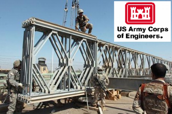 US Army Engineers helping Iraqi Army engineers in rebuilding a bridge to reconnect Taji in Iraq to a major highway