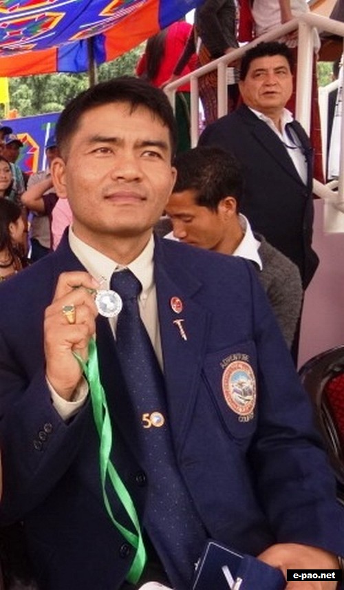  Dr. K. Romeo Meetei proudly showing the medal