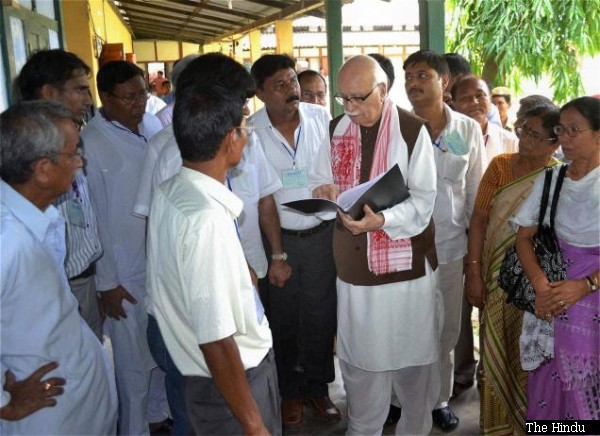 Senior BJP leader L.K. Advani interacts with riot-hit people at Titaguri relief camp in Kokrajhar district on July 30 2012